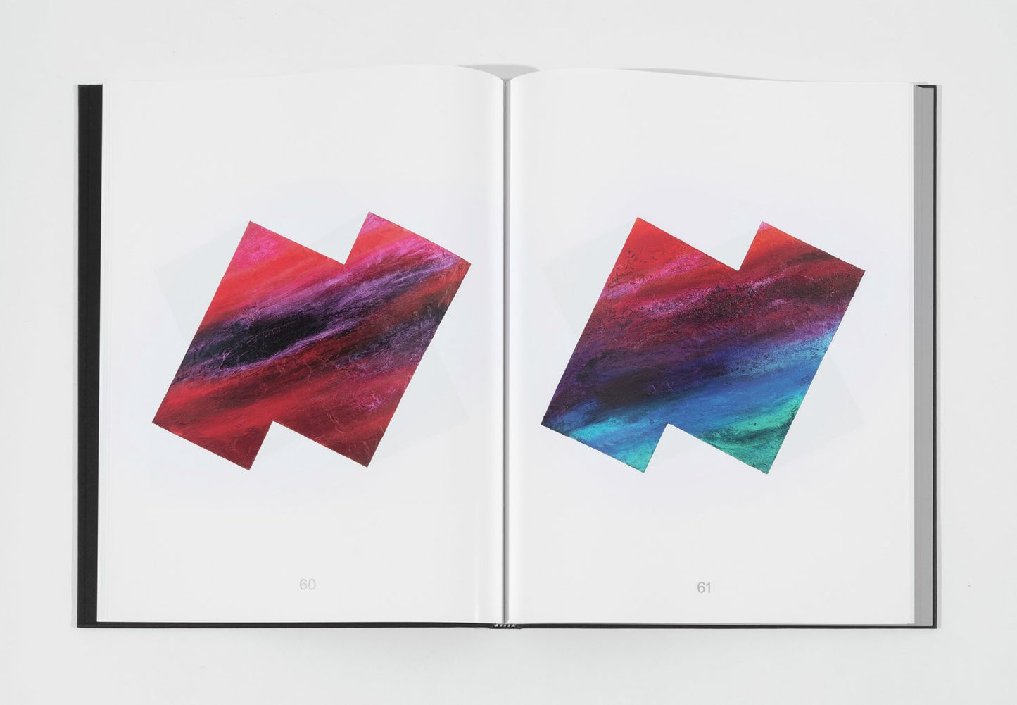 Page of ombre artworks, both are the same shape on either side of the page. The colors range from red and purple to indigo and teal.
